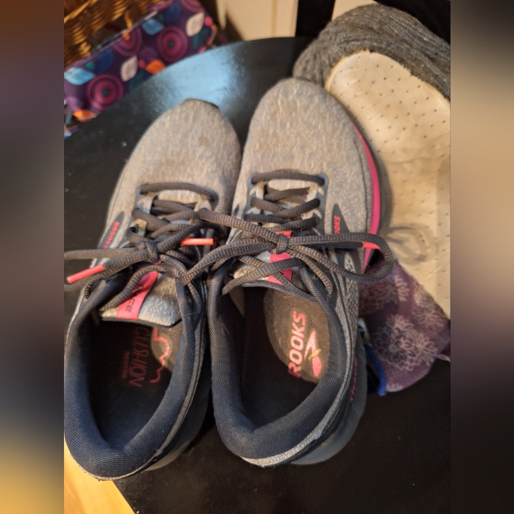 Brooks Gray and Pink Running Shoes name is "Trace".